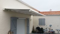 Banne motoris&eacute; et volet roulant " solaire"